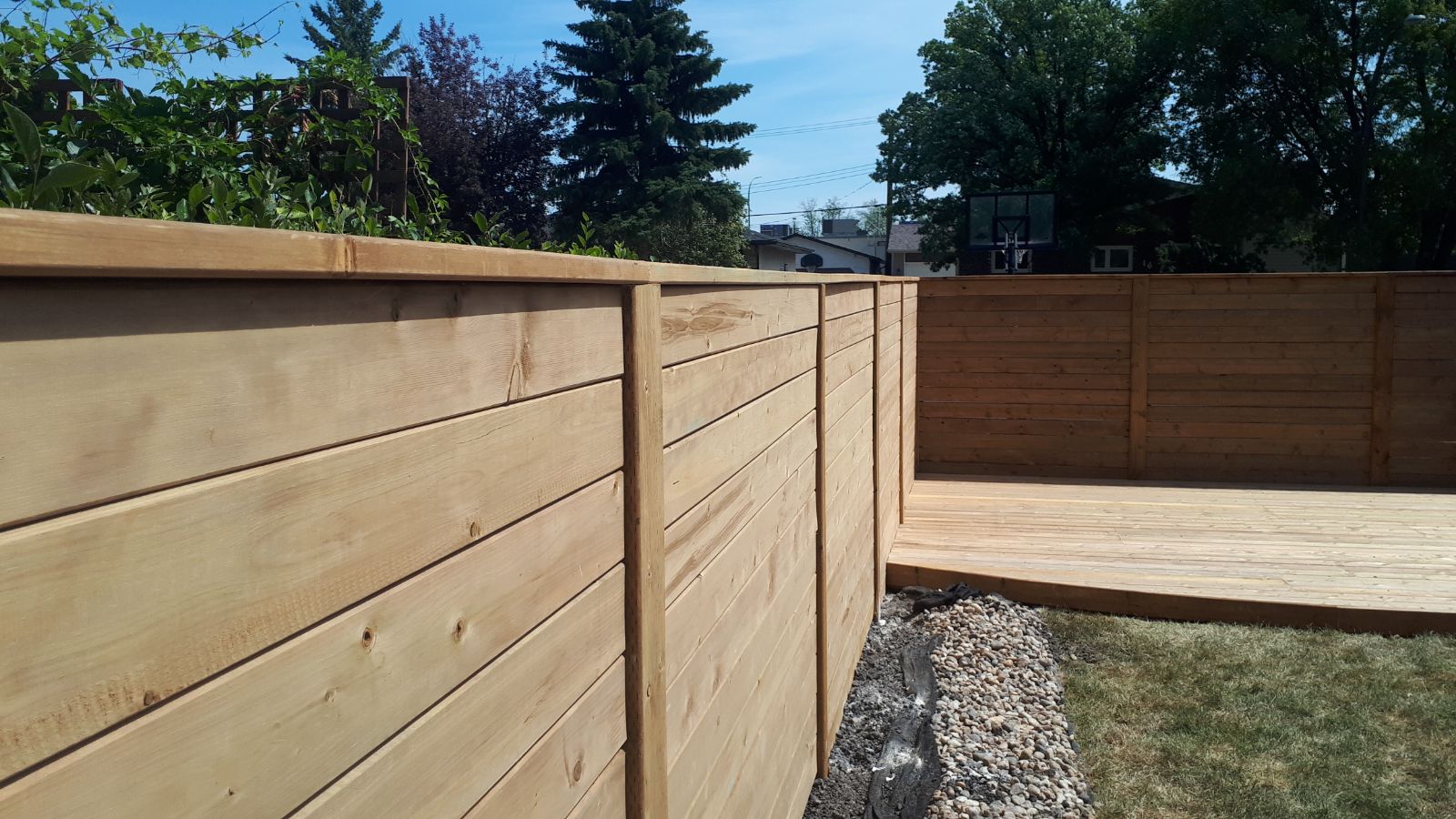 custom modern wood fence and deck